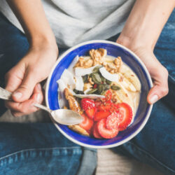 photo fino woman holding foods that increase ivf success rate test